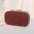 Rote Strass-Abendtasche-Variante mit einem funkelnden goldfarbenen Kristallgriff. - Rot