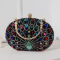 Elegante Retro-Abendtasche mit Pfauen-Strasssteinen, bunten Kristallen und Goldkette - Schwarz