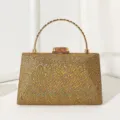 Elegante goldene Abendtasche mit Glitzer-Finish und einem metallischen Tragegriff - Gold