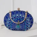Exquisite blaue Abendtasche mit Pfauen-Strasssteinen und elegantem Goldketten-Griff - Blau