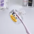 Portable transparent toothbrush head cover with a cute yellow cartoon duck character design - White