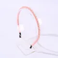 Serre-tête élégant en perles de cristal rose sur un support transparent pour cheveux. - Serre-tête 0.5 Quatre Perles de Cristal / Rose