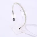 Elegant thin headband featuring clear crystal beads and non-slip black fabric ends for girls - White