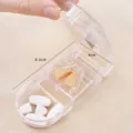 Portable transparent pill cutter box with 8.5cm length and built-in metal blade - 1 Piece/Pack / Clear