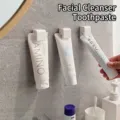 Adhesive wall-mounted storage clip for bathroom toothpaste and facial cleanser tubes - Square Toothpaste Clip / 1 Piece