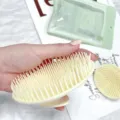 Cream-colored ergonomic scalp massage brush for deep hair washing and scalp care - Apricot