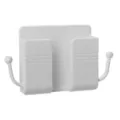 Sleek white wall-mounted phone charging stand with hooks for remote control storage - Blue