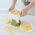 Multifunctional manual vegetable cutter for french fries and dicing, green base design - 1 Piece / White