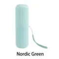 Portable Nordic green travel toothbrush case with striped texture and carrying strap - Nordic Green