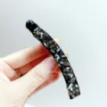 Eleganter schwarzer Bananen-Haarclip mit funkelnden grauen Kristall-Verzierungen für feines Haar. - Transparentes Grau