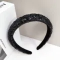 Detailed macro shot of luxury black crystal padded headband with sparkling rhinestone decor - Black Diamond