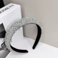 Close-up detail of a luxury rhinestone-encrusted headband designed for elegant party wear - White Diamond