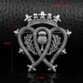 Detailed view of vintage Scottish thistle crown brooch, dimensions 4cm by 3.7cm, 6.6g weight - Celtic Woven Style (XZ-045)