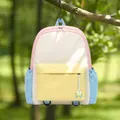 Zaino colorato in tonalità pastello per bambini appeso all'aperto in un parco soleggiato - Piccolo (3-6 anni) / Rosa Carminio