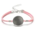 Macro view of a 20mm round alloy bezel tray on a pink Korea velvet cord bracelet. - White Gold Plated - Pink