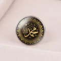 Detailed view of Islamic Muhammad calligraphy ring with gold mandala on black background - Adjustable Open / Muhammad Calligraphy