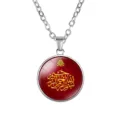 Close-up of time gem pendant necklace with red Arabic calligraphy design on silver chain - Red Gold Calligraphy