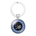 Detailed view of Middle Eastern glass cabochon keychain with Arabic calligraphy - Classic Calligraphy Style / Dark Blue