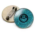 Detail of Islamic Allah calligraphy round brooch badge with vintage bronze pin back - Allah Cyan Background Style
