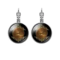 Detail of silver leverback earrings featuring gold Arabic calligraphy design under a glass cabochon - Prayer Calligraphy Style