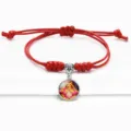 Red adjustable braided cord bracelet featuring a Ma Zu religious deity charm pendant - Red (A9105701)