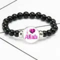 Middle Eastern religious theme elastic beaded bracelet featuring an I Love Allah pink charm - Black