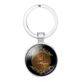 Porte-clés argenté gemme temporelle Moyen-Orient avec calligrafie arabe et motifs dorés - Style Calligraphie Vigne