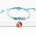 Adjustable light blue braided rope bracelet with traditional deity pendant - Light Blue (A9106101)