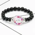 Close-up of Bible verse bracelet featuring floral pattern and Give Thanks quote - 12032517