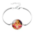 Silver-plated metal alloy bangle featuring a circular centerpiece with Mazu deity - Silver (A9101601)