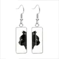 Close-up of stylish rectangular glass earrings featuring a black cat illustration. - 10x25mm / Side Face Black Cat