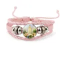 Detailed view of pink braided leather bracelet with Our Lady of Fatima glass cabochon - Pink