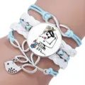 Close-up detail of a handmade multi-layer braided Autism Mom charm bracelet with puzzle pieces - 12038601