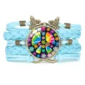 Handmade light blue braided bracelet with colorful peace sign and butterfly charms - Light Blue