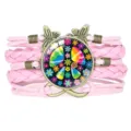 Pink handmade multi-layer braided peace sign bracelet with butterfly and infinity charms. - Pink