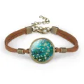 Detailed view of Van Gogh Almond Blossoms glass gem on brown suede rope handmade bracelet - Almond Blossoms (#06)