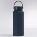 Detailed view of navy blue matte stainless steel water bottle with flexible handle - Matte Dark Blue