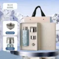 Hochwertiges 410ml blaues Reintitan-Magnet-Thermoskannen-Geschenkset mit Teesieb - 420ml / Rosa - Reines Titan Geschenkkarton