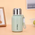 Mini portable mint green 316 stainless steel insulated thermal cup with a convenient hand strap - 450ml / Green