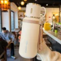 Large cream 316 stainless steel insulated tea thermos with portable carry strap handle - 600ml / White