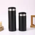 Two sizes of matte black 304 stainless steel insulated coffee mugs on a white background - 350 Units/Pack / Black