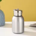 Portable silver mini stainless steel insulated water bottle with metal ring handle - 300ml / Steel