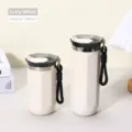 Ivory white stainless steel insulated coffee tumbler with carrying strap in two sizes - 500ml Rhombus / White