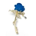 Blue rose flower brooch detail, gold-tone stem with sparkling rhinestones and a hanging drop. - D-1302 Blooming Blue