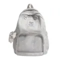 Dettaglio zaino Ita a pois grigi con tasca trasparente e simpatico ciondolo gatto. - senza ciondolo / Grigio