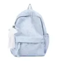 Joli sac à dos bleu clair imprimé de cœurs avec pendentif en dentelle pour étudiants. - Bleu