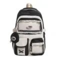 Joli sac à dos scolaire noir et blanc avec poche avant transparente et belle bordure en dentelle. - Noir