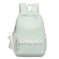 Grüner Polka-Dot-Schulrucksack mit weißer Spitzenborte und Schleifenanhänger für Mädchen. - Grün
