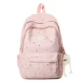 Vue de détail du sac à dos rose à motif d'étoiles, cartable mignon avec pendentif en peluche. - Sans Pendentif / Rose
