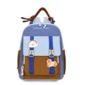Detailed view of the cute kids color block backpack with cartoon patches and double buckles. - Light Blue